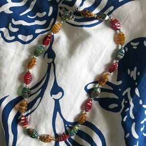Red, orange, and green bead necklace